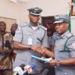 2. ACG Dera Nnadi, the newly appointed Assistant Inspector General of Customs and immediate past Customs Area Controller, Tincan Island Port (right ) and Comptroller Frank Onyeka, new Customs Area Controller, Tincan Island Port Command of NCS, during the handing / taking over ceremony in Lagos recently.