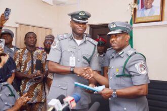 2. ACG Dera Nnadi, the newly appointed Assistant Inspector General of Customs and immediate past Customs Area Controller, Tincan Island Port (right ) and Comptroller Frank Onyeka, new Customs Area Controller, Tincan Island Port Command of NCS, during the handing / taking over ceremony in Lagos recently.